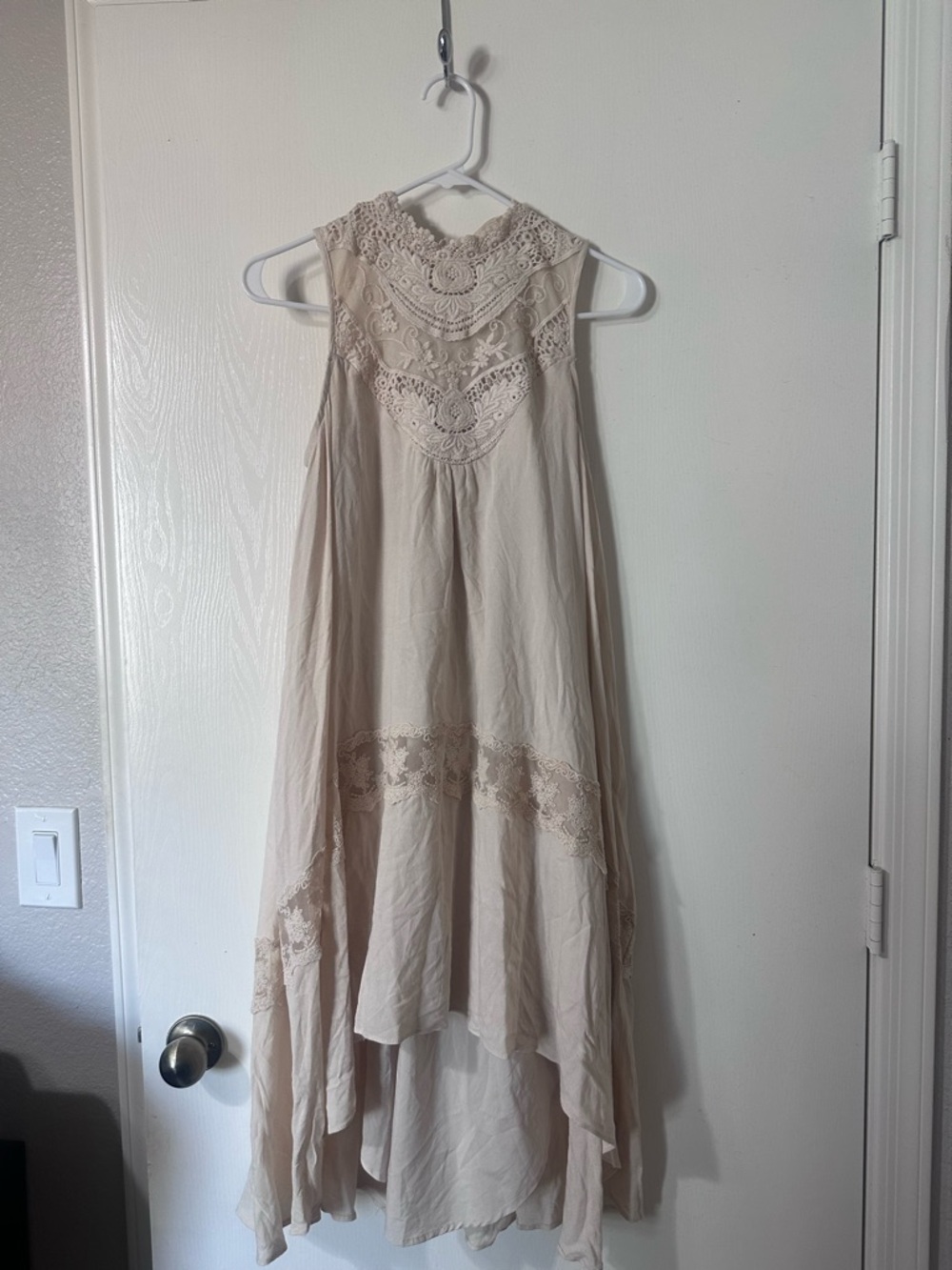 Joyfolie Sleeveless High-Low Dress with Crochet Lace in Beige